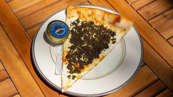 
					Sensasi Kuliner Mewah di Philadelphia: Pizza Kaviar Seharga Rp 1 Juta dengan Warisan Adonan Berusia 60 Tahun